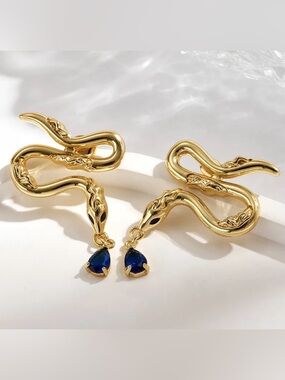 Gold Snake Drop Earrings with Blue Teardrop Stones
